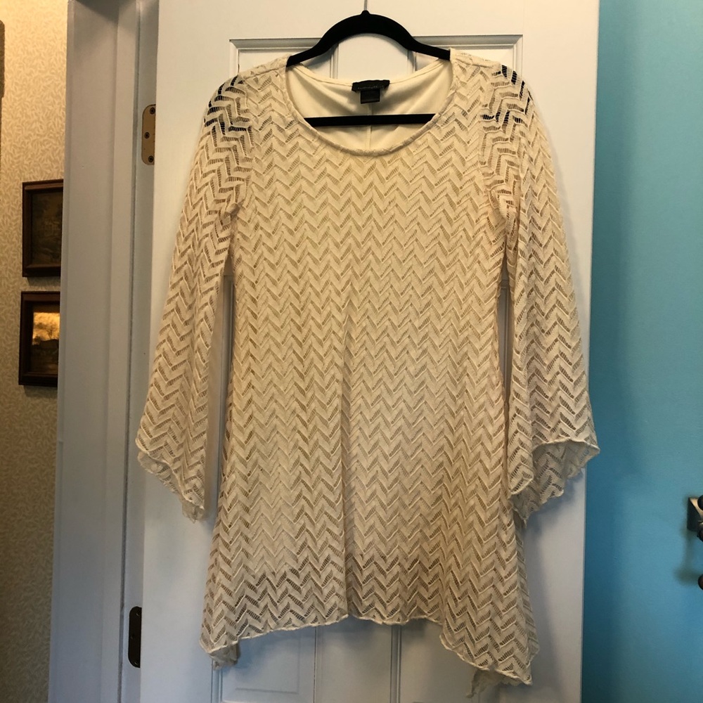 Cream colored mini dress or long top. Pair with leggings. Perfect for holidays!